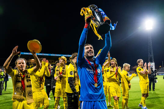 Nikita Haikin of Bodø/Glimt celebrates with the trophy