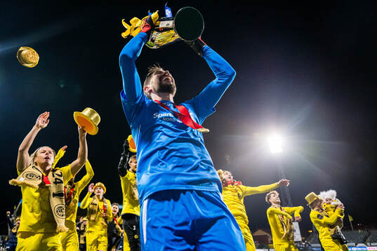 Nikita Haikin of Bodø/Glimt celebrates with the trophy