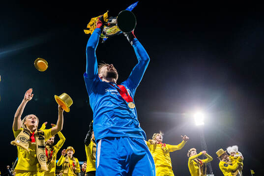 Nikita Haikin of Bodø/Glimt celebrates with the trophy
