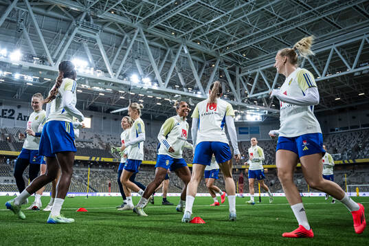 Madelen Janogy and Kosovare Asllani of the Swedish women's
