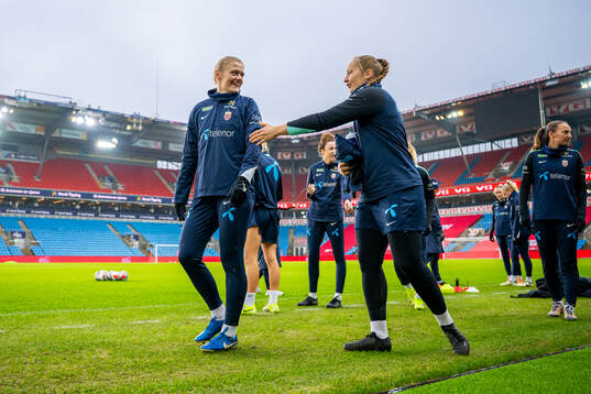 Mathilde Harviken and goalkeeper Aurora Mikalsen of the