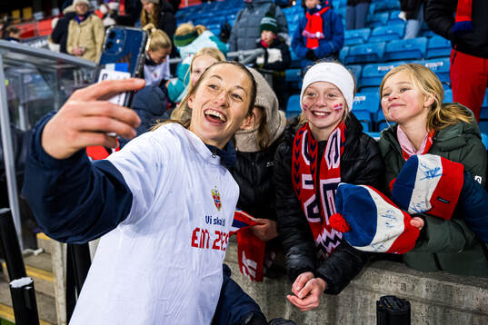 Cecilie Hauståker Fiskerstrand of Norway with a fan