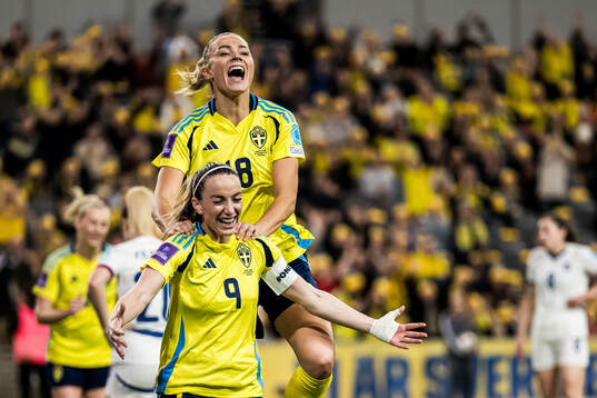 Kosovare Asllani and Fridolina Rolfö of Sweden celebrating