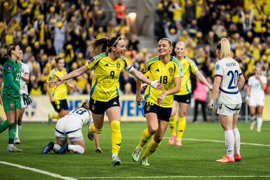 Kosovare Asllani and Fridolina Rolfö of Sweden celebrating