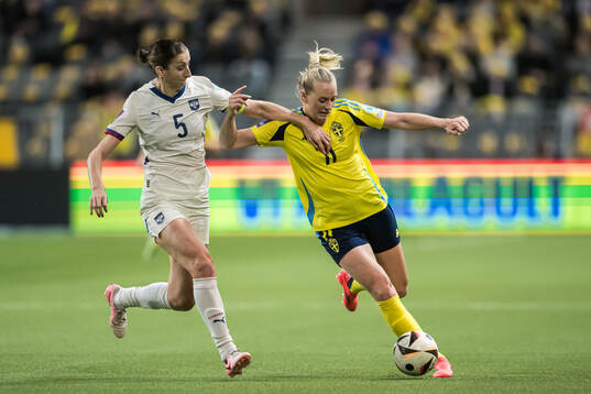 Violeta Slovic of Serbia and Stina Blackstenius of Sweden
