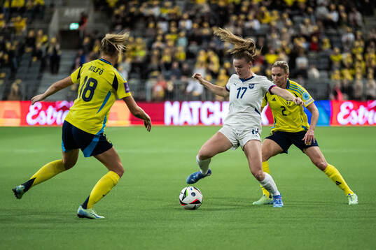 Allegra Poljak of Serbia against Fridolina Rolfö and Jonna
