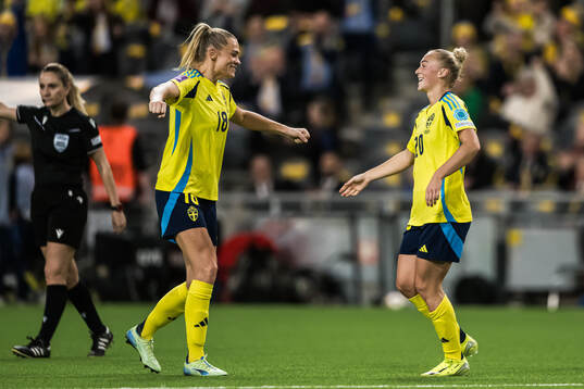 Hanna Bennison and Fridolina Rolfö of Sweden celebrating
