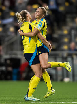 Hanna Bennison and Fridolina Rolfö of Sweden celebrating
