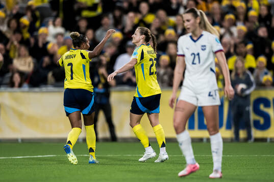 Anna Anvegård and Madelen Janogy of Sweden celebrating the