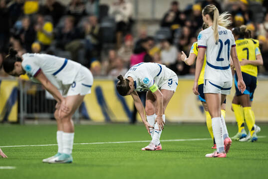 Violeta Slovic of Serbia looks dejected