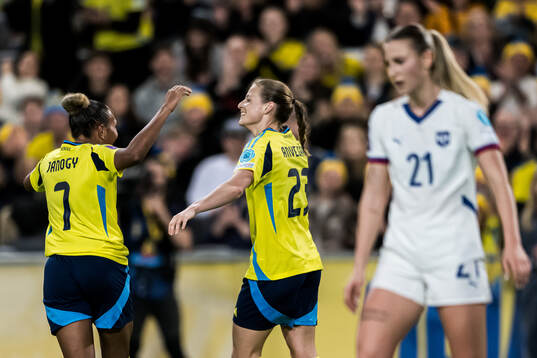 Anna Anvegård and Madelen Janogy of Sweden celebrating the