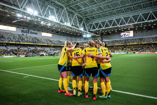 Filippa Angeldahl of Sweden celebrates with team mates
