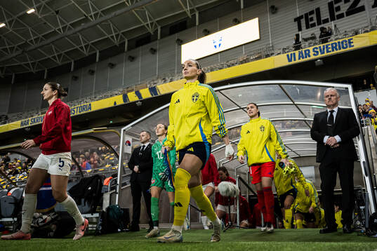 Kosovare Asllani and Zecira Musovic of Sweden