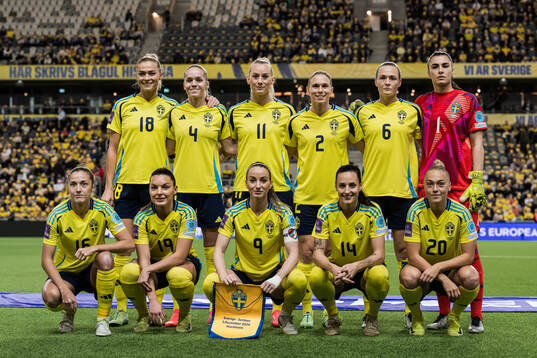 The starting eleven of Sweden pose for a team photo
