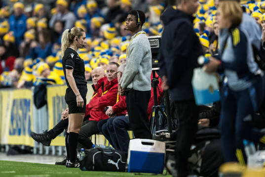 Referee Eleni Antoniou at a VAR situation