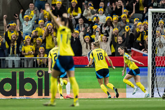 Kosovare Asllani of Sweden celebrates scoring the 2-0 goal