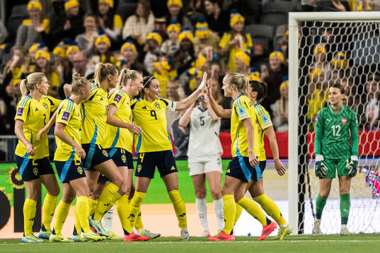 Stina Blackstenius and Kosovare Asllani of Sweden