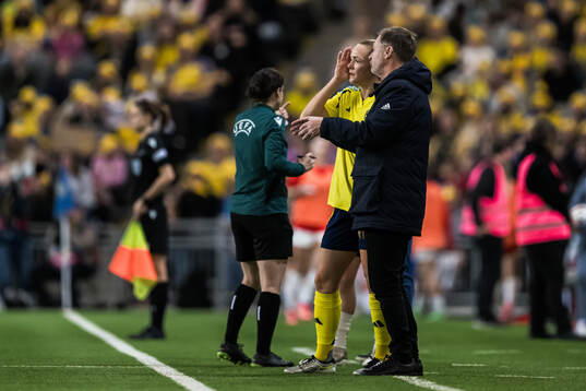 Magdalena Eriksson and Head coach Peter Gerhardsson of