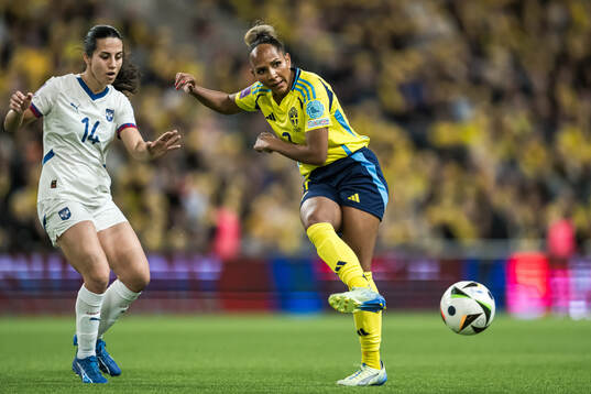 Vesna Milivojevic of Serbia and Madelen Janogy of Sweden