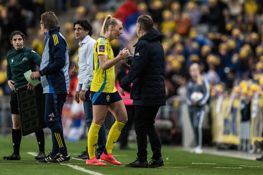 Stina Blackstenius and Head coach Peter Gerhardsson of