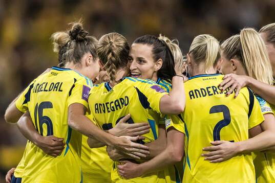 Anna Anvegård and Nathalie Björn of Sweden celebrate