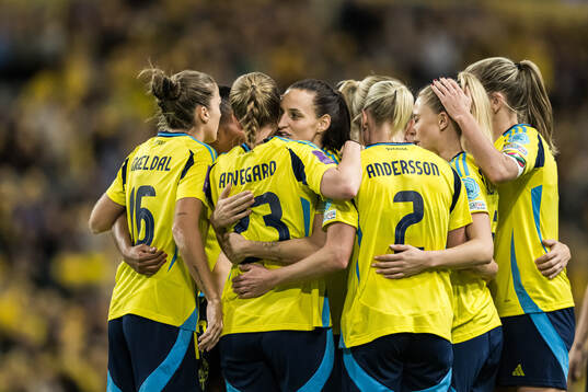 Anna Anvegård and Nathalie Björn of Sweden celebrate