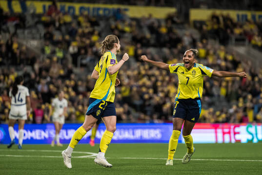 Anna Anvegård and Madelen Janogy of Sweden celebrating the