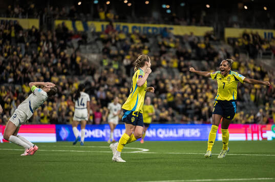 Anna Anvegård and Madelen Janogy of Sweden celebrating the