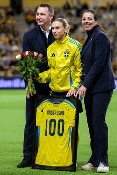 Jonna Andersson of Sweden is celebrated for 100 games with