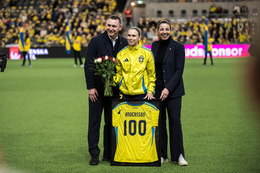 Jonna Andersson of Sweden is celebrated for 100 games with