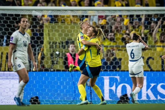 Hanna Bennison and Fridolina Rolfö of Sweden celebrating