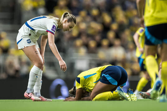 Madelen Janogy of Sweden in pain