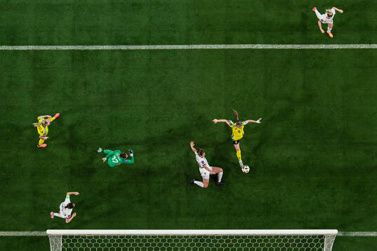 Kosovare Asllani of Sweden scores the 2-0 goal behind