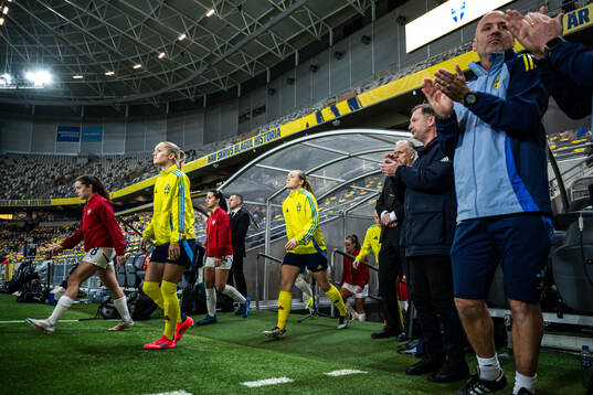 Hanna Lundkvist and Magdalena Eriksson of Sweden enters the