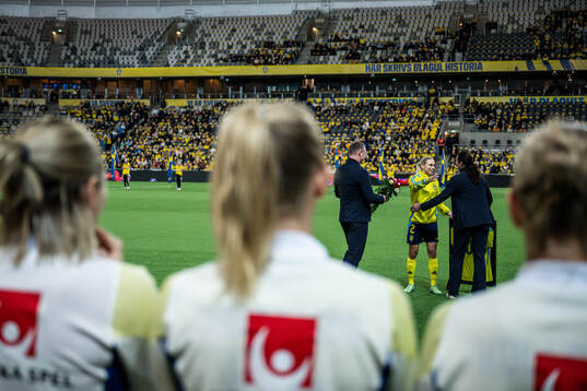 Jonna Andersson of Sweden is celebrated for 100 games with