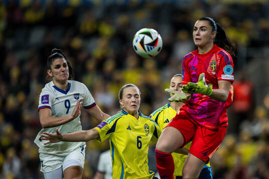 Magdalena Eriksson and goalkeeper Zecira Musovic of Sweden