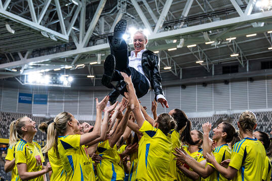 Caroline Seger is lifted by former teammates