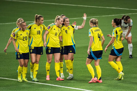 Stina Blackstenius and Kosovare Asllani of Sweden