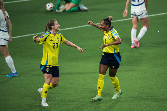 Anna Anvegård and Madelen Janogy of Sweden celebrating the