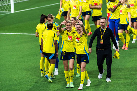 Fridolina Rolfö and Linda Sembrant of Sweden celebrate