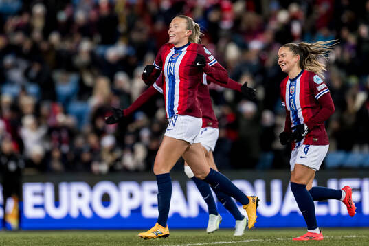 Synne Sofie Kinden Jensen of Norway celebrates scoring the