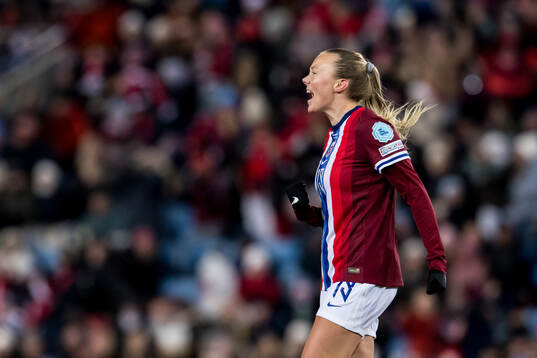 Synne Sofie Kinden Jensen of Norway celebrates scoring the