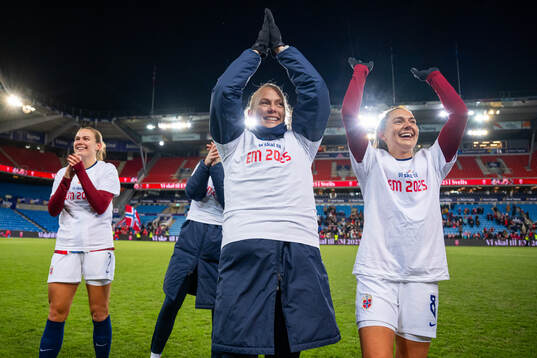 Guro Bergsvand and Vilde Bøe Risa of Norway celebrate