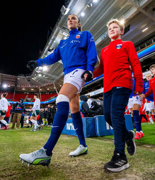 Ingrid Syrstad Engen of Norway enters the pitch