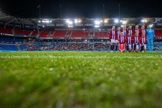 The starting eleven of Norway pose for a team photo