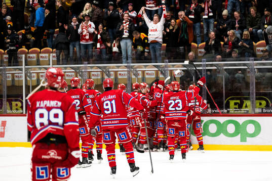 Timrås spelare jublar