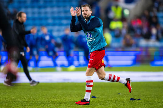 Simen Rafn of Fredrikstad warms up
