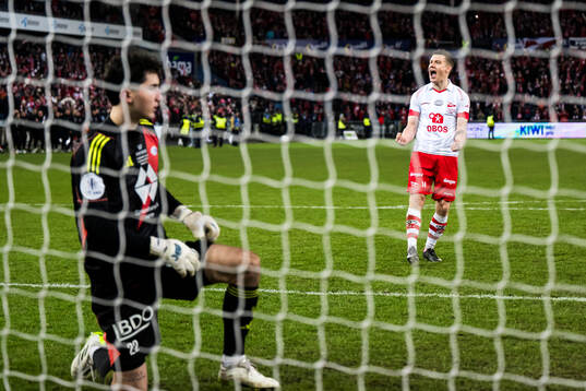 Joannes Bjartalid of Fredrikstad scores at a shoot out