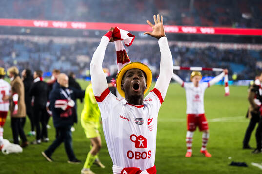 Maxwell Woledzi of Fredrikstad celebrates