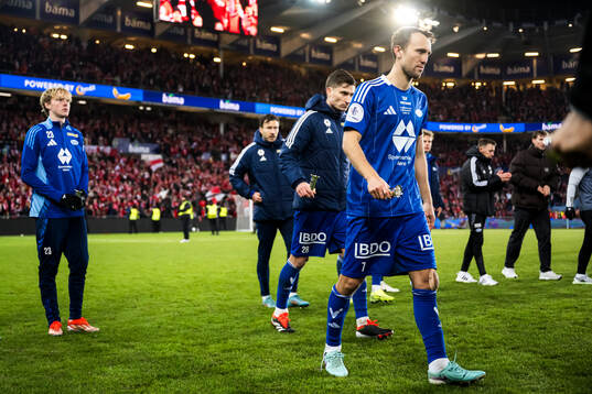 Magnus Wolff Eikrem of Molde looks dejected